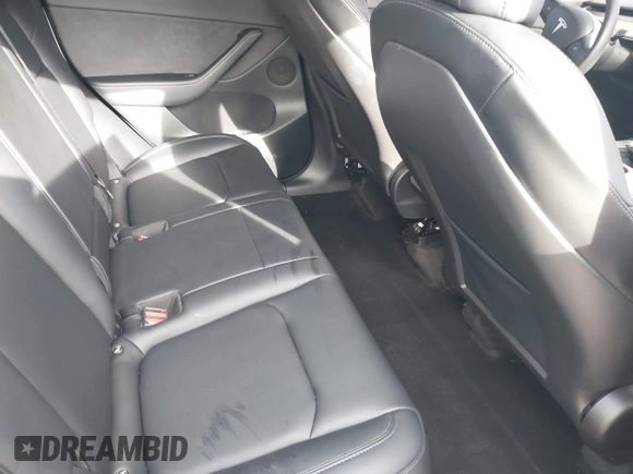 2022 Tesla Model Y Long Range z VIN 7SAYGDEE0NF435252, wystawiony jako IAAI lot #41449612 z przebiegiem 48 671 mil mil oraz . Historia ofert i sprzedaży dostępna na DreamBid. Obrazek 8.