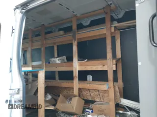 2019 Ford Transit Cargo with VIN 1FTBW3XG4KKA66859, listed as a IAAI auction lot 41940297 with 175,609 mi miles. Bid and sale history available at carsss.com. Image 8.