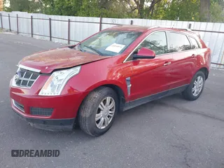 2011 Cadillac SRX Luxury Collection z VIN 3GYFNAEY2BS517192, wystawiony jako IAAI lot #42494074 z przebiegiem 191 094 mil mil oraz . Historia ofert i sprzedaży dostępna na DreamBid. Obrazek 2.