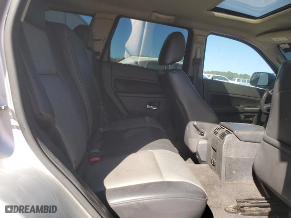 2009 Jeep Grand Cherokee Laredo with VIN 1J8GS48KX9C514254, listed as a Copart auction lot 49809175 with 293,040 mi miles and Salvage Title. Bid and sale history available at carsss.com. Image 11.