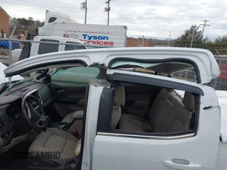 2015 GMC Canyon 2WD SLE with VIN 1GTG5BE33F1132736, listed as a IAAI auction lot 41094687 with 26,185 mi miles. Bid and sale history available at carsss.com. Image 6.