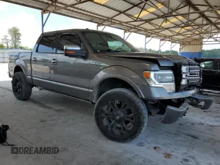 2014 Ford F-150 XL with VIN 1FTFW1EF1EFC83847, listed as a Copart auction lot 62324145 with 211,763 mi miles and Salvage title. Bid and sale history available at DreamBid. Image 4.