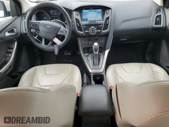 2016 Ford Focus Titanium z VIN 1FADP3N23GL345904, wystawiony jako Copart lot #60139525 z przebiegiem 97 572 mil mil oraz Szkoda całkowita • Salvage title. Historia ofert i sprzedaży dostępna na DreamBid. Obrazek 8.