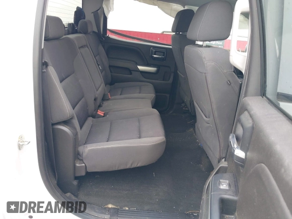 2018 Chevrolet Silverado 1500 LT with VIN 1GCUKREC0JF208509, listed as a IAAI auction lot 41794616 with 96,962 mi miles and . Bid and sale history available at DreamBid. Image 8.