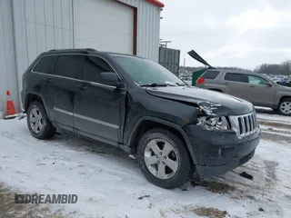 2011 Jeep Grand Cherokee 70th Anniversary with VIN 1J4RR4GG4BC519507, listed as a IAAI auction lot 41537091 with 175,967 mi miles. Bid and sale history available at carsss.com. Image 1.