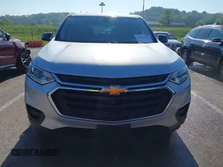2018 Chevrolet Traverse LS z VIN 1GNERFKW7JJ145166, wystawiony jako IAAI lot #42161304 z przebiegiem 104 165 mil mil oraz . Historia ofert i sprzedaży dostępna na DreamBid. Obrazek 12.