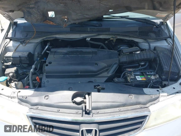 2004 Honda Odyssey EX-L with VIN 5FNRL18774B028164, listed as a IAAI auction lot 42454877 with 135,720 mi miles and . Bid and sale history available at DreamBid. Image 10.