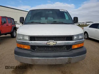 2013 Chevrolet Express Passenger 1LT z VIN 1GAZGYFG4D1140342, wystawiony jako Copart lot #75170404 z przebiegiem 201 580 mil mil oraz Czysty tytuł • Clean title. Historia ofert i sprzedaży dostępna na DreamBid. Obrazek 5.