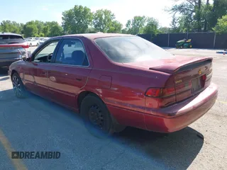 1997 Toyota Camry LE z VIN 4T1BG22K1VU113126, wystawiony jako IAAI lot #42257715 z przebiegiem 177 605 mil mil oraz . Historia ofert i sprzedaży dostępna na DreamBid. Obrazek 3.