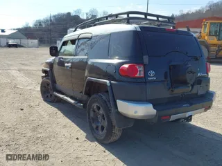 2007 Toyota FJ Cruiser with VIN JTEBU11F370035644, listed as a IAAI auction lot 41698247 with 214,482 mi miles. Bid and sale history available at carsss.com. Image 3.