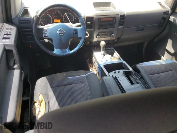 2010 Nissan Titan SE with VIN 1N6BA0ED4AN320540, listed as a Copart auction lot 51779065 with 252,827 mi miles and Salvage title. Bid and sale history available at DreamBid. Image 8.