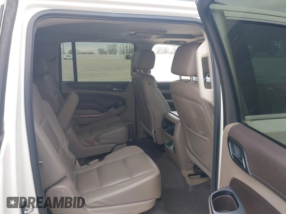 2015 Chevrolet Suburban LTZ with VIN 1GNSCKKC7FR641421, listed as a IAAI auction lot 41637137 with 139,001 mi miles and . Bid and sale history available at DreamBid. Image 8.