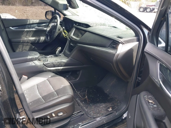 2020 Cadillac XT5 Premium Luxury AWD with VIN 1GYKNDRS3LZ107687, listed as a IAAI auction lot 41887306 with 54,959 mi miles and . Bid and sale history available at DreamBid. Image 5.