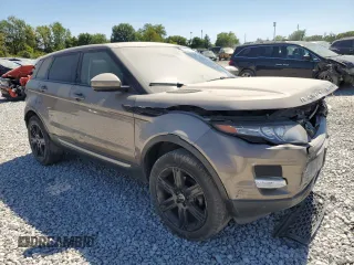2015 Land Rover Range Rover Evoque Pure Premium z VIN SALVR2BG9FH005735, wystawiony jako Copart lot #69971924 z przebiegiem Nie podano mil oraz Szkoda całkowita • Salvage title. Historia ofert i sprzedaży dostępna na DreamBid. Obrazek 4.