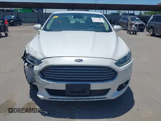 2014 Ford Fusion SE Hybrid with VIN 3FA6P0LUXER233658, listed as a IAAI auction lot 42311588 with 106,282 mi miles and . Bid and sale history available at DreamBid. Image 12.