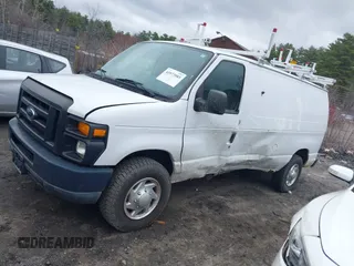 2011 Ford Econoline Cargo Commercial z VIN 1FTNE2EL3BDA19868, wystawiony jako IAAI lot #41973985 z przebiegiem 128 980 mil mil oraz . Historia ofert i sprzedaży dostępna na DreamBid. Obrazek 14.