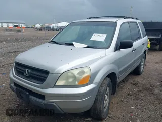 2005 Honda Pilot LX with VIN 2HKYF18185H572190, listed as a IAAI auction lot 42135127 with 201,768 mi miles. Bid and sale history available at carsss.com. Image 2.