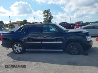 2013 Chevrolet Avalanche LTZ with VIN 3GNMCGE05DG351022, listed as a IAAI auction lot 41138090 with 197,159 mi miles and . Bid and sale history available at DreamBid. Image 13.