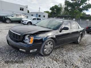 2002 Cadillac DeVille DTS with VIN 1G6KF57962U233811, listed as a Copart auction lot 80435034 with 62,005 mi miles and Salvage Title. Bid and sale history available at carsss.com. Image 1.