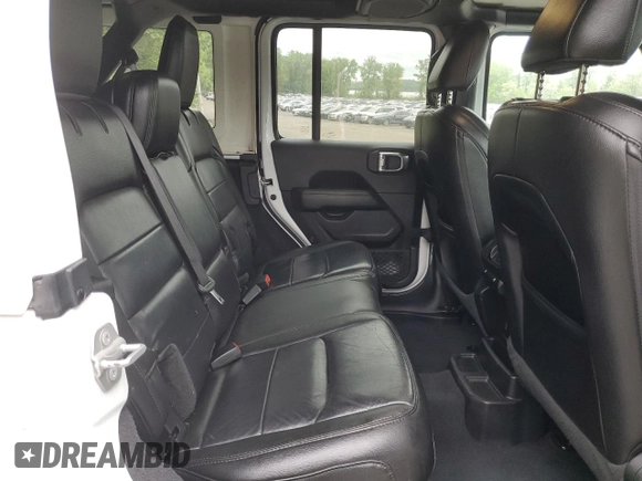 2021 Jeep Wrangler Unlimited Sahara with VIN 1C4HJXEN7MW563272, listed as a Copart auction lot 57398575 with 73,861 mi miles and Salvage title. Bid and sale history available at DreamBid. Image 11.