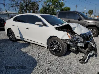 2016 Buick LaCrosse Sport Touring with VIN 1G4G45G3XGF172622, listed as a Copart auction lot 57595255 with 63,893 mi miles and Salvage title. Bid and sale history available at DreamBid. Image 4.