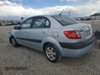 2009 Kia Rio LX with VIN KNADE223496469797, listed as a Copart auction lot 71005774 with 130,675 mi miles and Salvage Title. Bid and sale history available at carsss.com. Image 2.