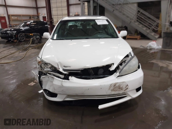 2005 Toyota Camry LE with VIN 4T1BF30KX5U083054, listed as a IAAI auction lot 41814022 with 195,608 mi miles and . Bid and sale history available at DreamBid. Image 13.