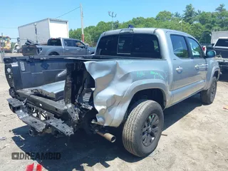 2023 Toyota Tacoma SR with VIN 3TYCZ5AN2PT141576, listed as a IAAI auction lot 42492127 with 43,431 mi miles and . Bid and sale history available at DreamBid. Image 4.