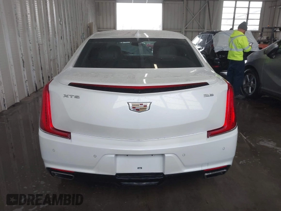 2018 Cadillac XTS Luxury z VIN 2G61M5S38J9156679, wystawiony jako IAAI lot #41574733 z przebiegiem 65 637 mil mil oraz . Historia ofert i sprzedaży dostępna na DreamBid. Obrazek 16.