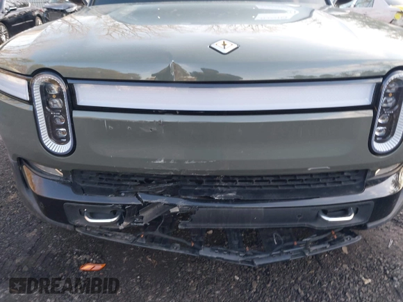 2022 Rivian R1S Launch Edition with VIN 7PDSGABL4NN000409, listed as a IAAI auction lot 41433164 with 39,603 mi miles. Bid and sale history available at carsss.com. Image 6.
