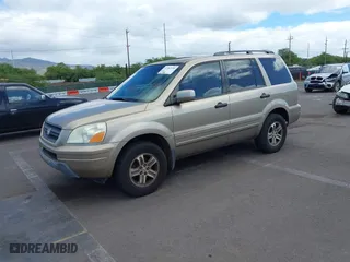 2005 Honda Pilot EX-L with VIN 5FNYF18515B010116, listed as a IAAI auction lot 41762150 with 217,954 mi miles. Bid and sale history available at carsss.com. Image 2.