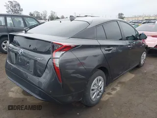 2018 Toyota Prius Two with VIN JTDKBRFUXJ3591956, listed as a IAAI auction lot 41848336 with 62,560 mi miles and . Bid and sale history available at DreamBid. Image 4.
