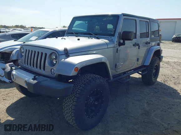 2015 Jeep Wrangler Unlimited Sahara with VIN 1C4BJWEG2FL558860, listed as a IAAI auction lot 41937360 with 113,627 mi miles. Bid and sale history available at carsss.com. Image 18.