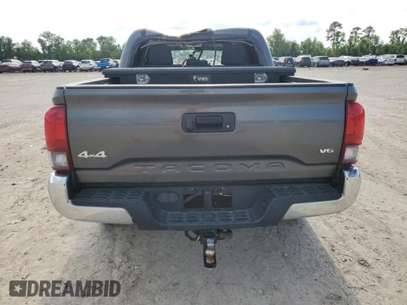 2019 Toyota Tacoma SR z VIN 3TMCZ5AN1KM191177, wystawiony jako Copart lot #56282085 z przebiegiem 110 837 mil mil oraz Szkoda całkowita • Salvage title. Historia ofert i sprzedaży dostępna na DreamBid. Obrazek 6.