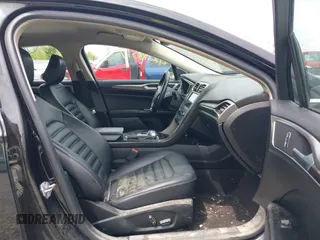 2020 Ford Fusion SEL z VIN 3FA6P0CD5LR131097, wystawiony jako IAAI lot #42218517 z przebiegiem 94 394 mil mil oraz . Historia ofert i sprzedaży dostępna na DreamBid. Obrazek 5.