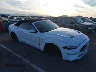 2021 Ford Mustang EcoBoost with VIN 1FATP8UH2M5120338, listed as a IAAI auction lot 40958016 with 76,979 mi miles. Bid and sale history available at carsss.com. Image 1.