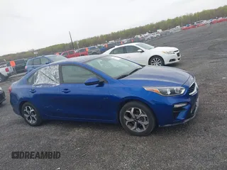 2019 Kia Forte LXS z VIN 3KPF24AD6KE041448, wystawiony jako IAAI lot #42035571 z przebiegiem 128 536 mil mil oraz . Historia ofert i sprzedaży dostępna na DreamBid. Obrazek 13.