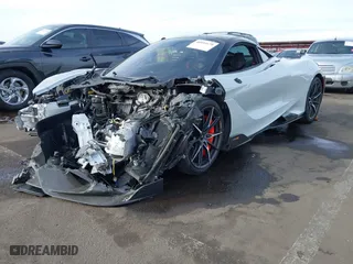 2021 McLaren 765LT with VIN SBM14RCA3MW765344, listed as a IAAI auction lot 40934179 with 10,900 mi miles. Bid and sale history available at carsss.com. Image 2.