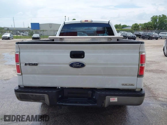 2013 Ford F-150 XL with VIN 1FTMF1CM9DFC13973, listed as a IAAI auction lot 42326721 with 209,911 mi miles and . Bid and sale history available at DreamBid. Image 16.