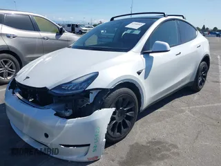2023 Tesla Model Y Long Range with VIN 7SAYGDEEXPA152986, listed as a IAAI auction lot 41946665 with 13,574 mi miles and . Bid and sale history available at carsss.com. Image 19.