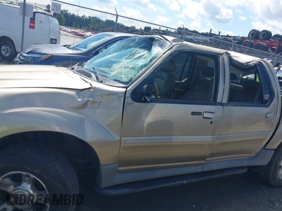 2003 Ford Explorer Sport Trac XLS z VIN 1FMZU77E23UC35868, wystawiony jako IAAI lot #42530211 z przebiegiem 223 483 mil mil oraz . Historia ofert i sprzedaży dostępna na DreamBid. Obrazek 14.