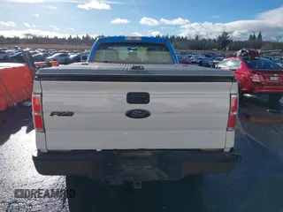 2014 Ford F-150 XL with VIN 1FTFX1CF4EKG53325, listed as a IAAI auction lot 41060015 with 216,554 mi miles. Bid and sale history available at carsss.com. Image 16.