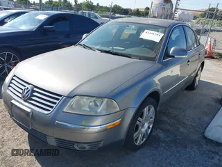 2005 Volkswagen Passat GLS z VIN WVWAD63B05P029893, wystawiony jako IAAI lot #42451294 z przebiegiem 101 920 mil mil oraz . Historia ofert i sprzedaży dostępna na DreamBid. Obrazek 2.