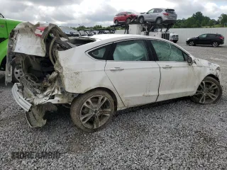 2017 Ford Fusion Titanium z VIN 3FA6P0K93HR227511, wystawiony jako Copart lot #60719505 z przebiegiem Nie podano mil oraz Szkoda całkowita • Salvage title. Historia ofert i sprzedaży dostępna na DreamBid. Obrazek 3.