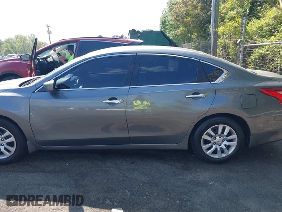 2017 Nissan Altima SV with VIN 1N4AL3AP5HC223921, listed as a IAAI auction lot 42069955 with 166,564 mi miles and . Bid and sale history available at DreamBid. Image 14.