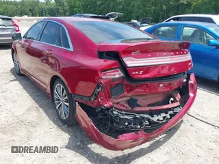 2017 Lincoln MKZ Select z VIN 3LN6L5C92HR624169, wystawiony jako IAAI lot #42242255 z przebiegiem 133 442 mil mil oraz . Historia ofert i sprzedaży dostępna na DreamBid. Obrazek 3.
