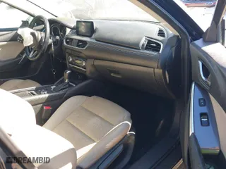 2017 Mazda Mazda6 Touring with VIN JM1GL1V57H1129309, listed as a IAAI auction lot 41654988 with 117,705 mi miles. Bid and sale history available at carsss.com. Image 5.