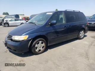 2000 Honda Odyssey EX z VIN 2HKRL1870YH501975, wystawiony jako Copart lot #62856994 z przebiegiem 153 060 mil mil oraz Szkoda całkowita • Salvage title. Historia ofert i sprzedaży dostępna na DreamBid. Obrazek 1.