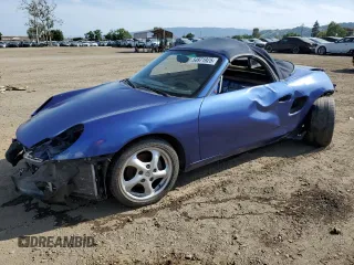 1998 Porsche Boxster z VIN WP0CA2989WU626453, wystawiony jako Copart lot #54971925 z przebiegiem 116 461 mil mil oraz Nie do naprawy • Non repairable. Historia ofert i sprzedaży dostępna na DreamBid. Obrazek 1.