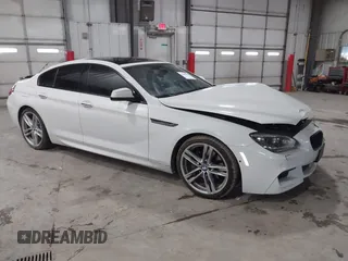 2014 BMW 6 Series 650i xDrive with VIN WBA6B4C55ED371378, listed as a IAAI auction lot 41640888 with 80,927 mi miles. Bid and sale history available at carsss.com. Image 1.